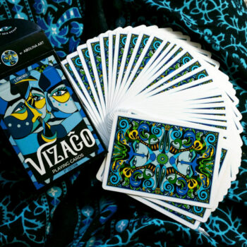 VIZAĜO Lumino (the blue deck) in a sea of blue fabric VIZAĜO Playing Cards by Annette Abolins