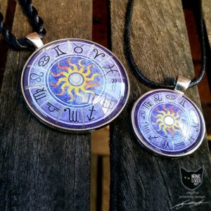 25mm and 40mm art pendants featuring zodiac artwork sealed under glass cabochon and set in pendant bezels